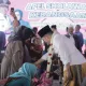 Bupati Jember menyapa warga dalam acara Bunga Desaku. (Foto: Dok/Diskominfo Jember)