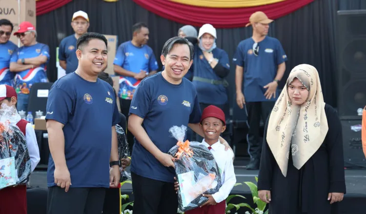 Gerakan Nasional Migran Aman di Alun-Alun Jember, Minggu (14/6/2026). (Foto: Dok/Diskominfo Jember)