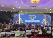 BPJS Ketenagakerjaan Jember Serahkan Santunan Rp42 Juta dan Kartu Kepesertaan UMKM pada Festival Kemudahan dan Pelindung Usaha Mikro 2026